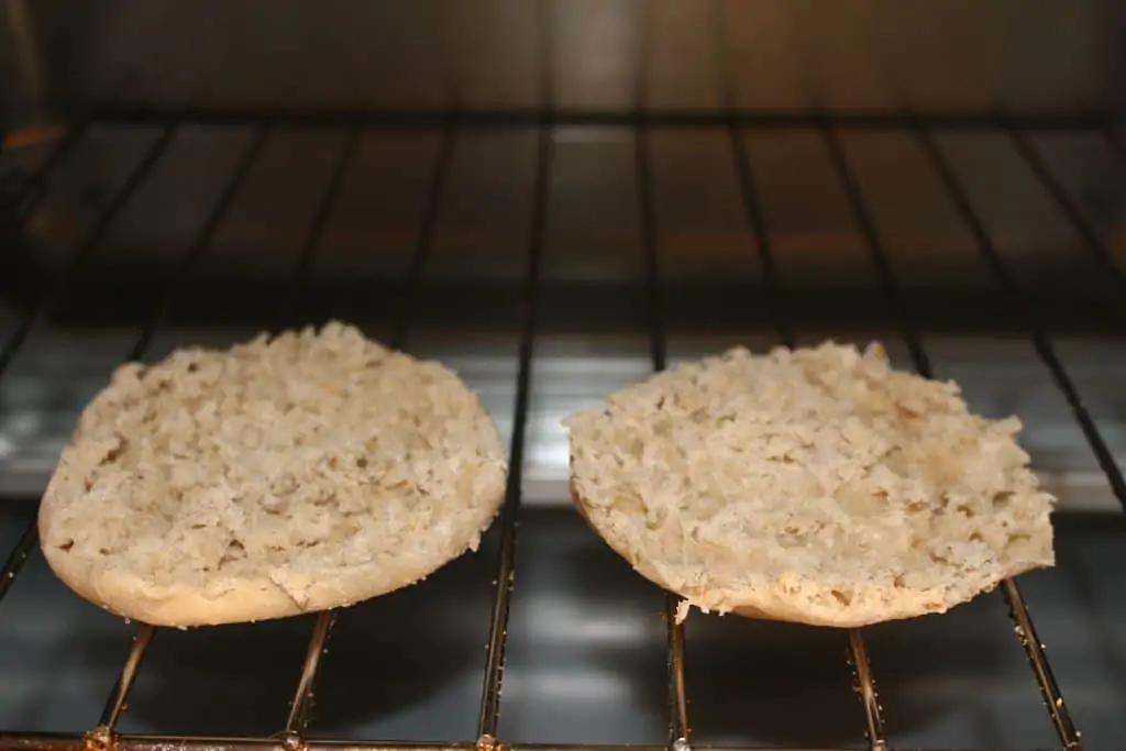 raw english muffin in toaster