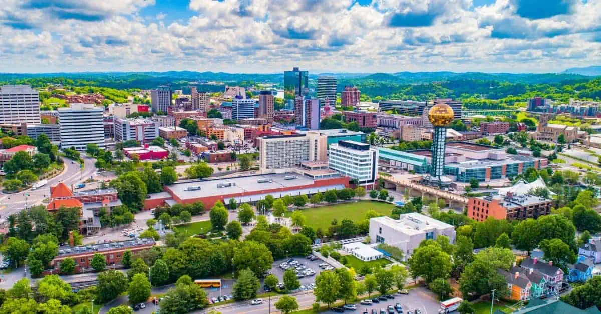 Skyline view of the City of Knoxville TN with mountains in the background