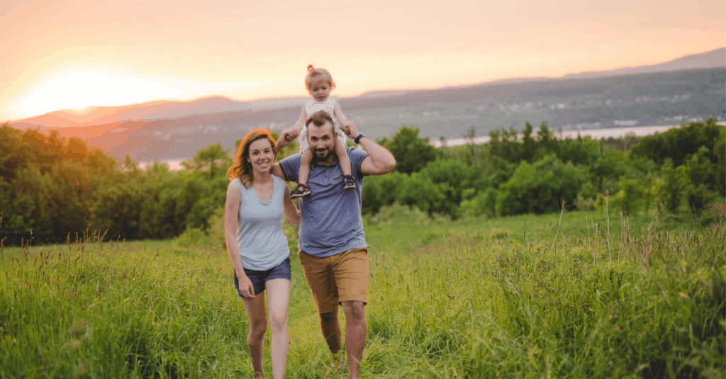 beautiful happy family walking with a scenic mountain view