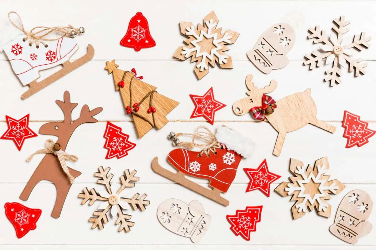 Laser cut wooden Christmas ornaments in various shapes representing Christmas craft fairs near Tri-Cities TN.