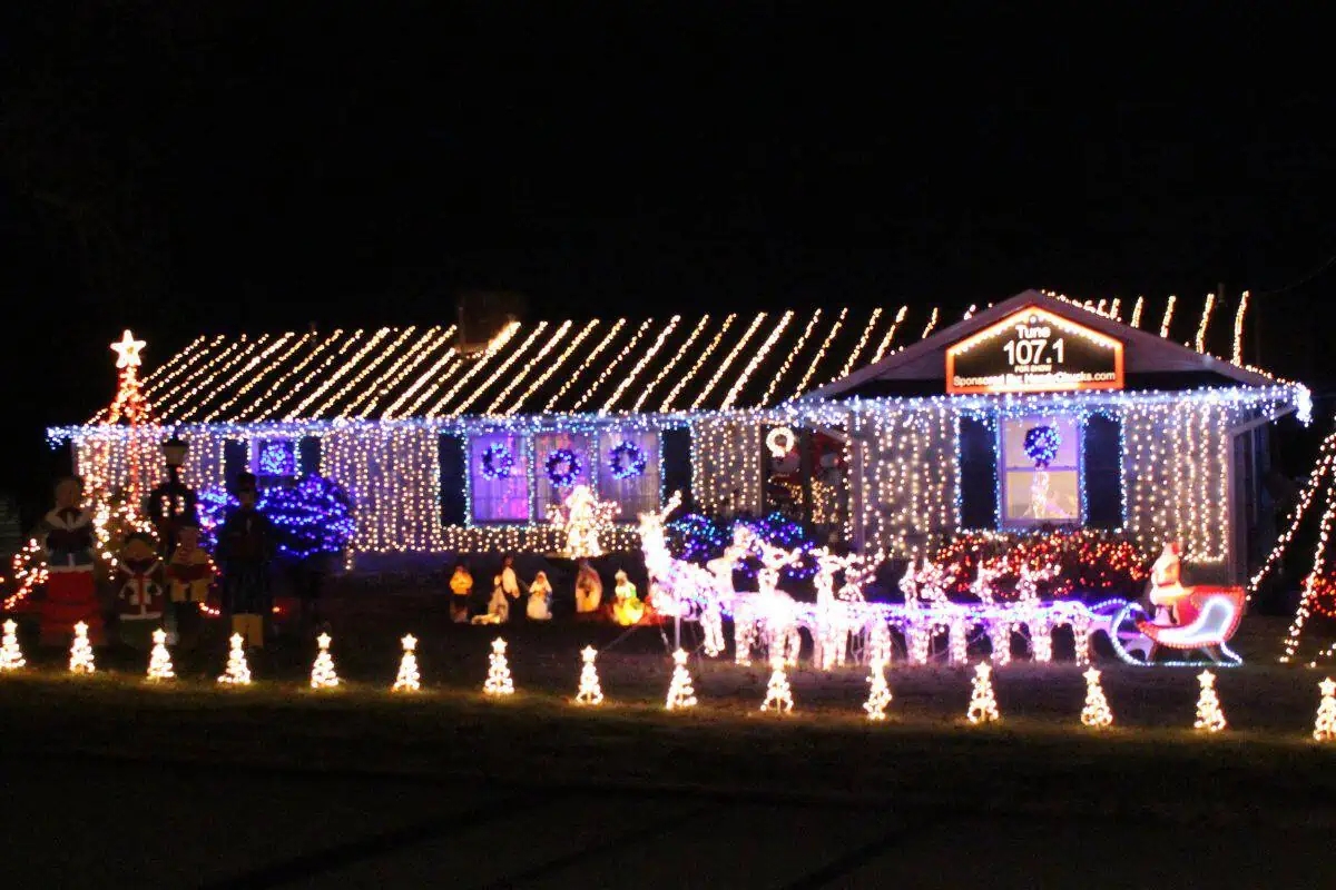 A house with blue and white Christmas lights in Knoxville TN.